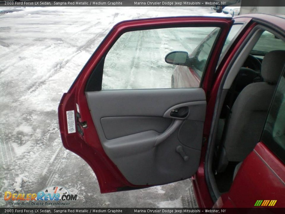 2003 Ford Focus LX Sedan Sangria Red Metallic / Medium Graphite Photo #15