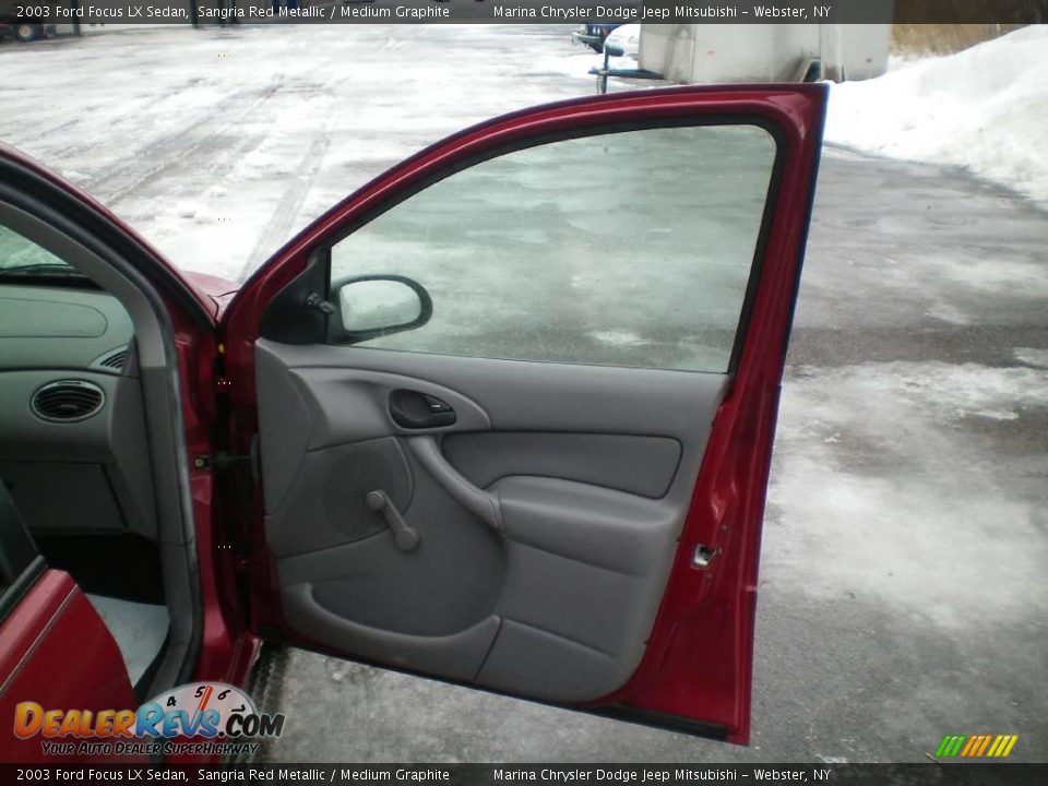 2003 Ford Focus LX Sedan Sangria Red Metallic / Medium Graphite Photo #19