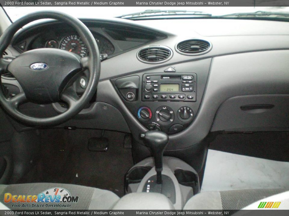 2003 Ford Focus LX Sedan Sangria Red Metallic / Medium Graphite Photo #21