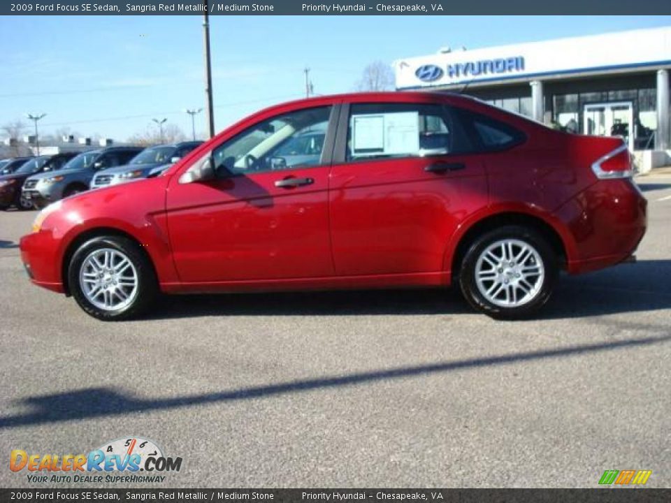 2009 Ford Focus SE Sedan Sangria Red Metallic / Medium Stone Photo #3