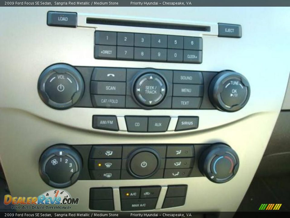 2009 Ford Focus SE Sedan Sangria Red Metallic / Medium Stone Photo #14