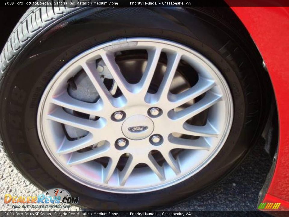 2009 Ford Focus SE Sedan Sangria Red Metallic / Medium Stone Photo #20
