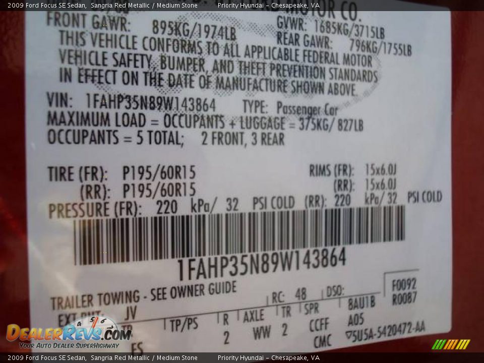 2009 Ford Focus SE Sedan Sangria Red Metallic / Medium Stone Photo #23