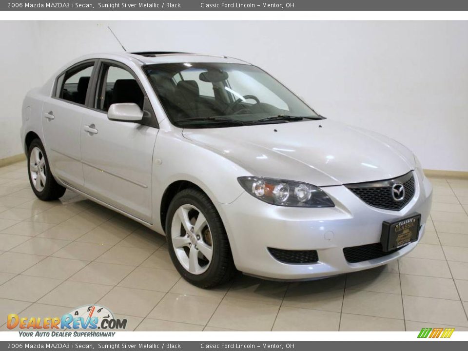 2006 Mazda MAZDA3 i Sedan Sunlight Silver Metallic / Black Photo #1