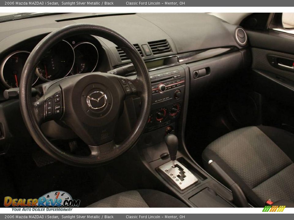 2006 Mazda MAZDA3 i Sedan Sunlight Silver Metallic / Black Photo #9