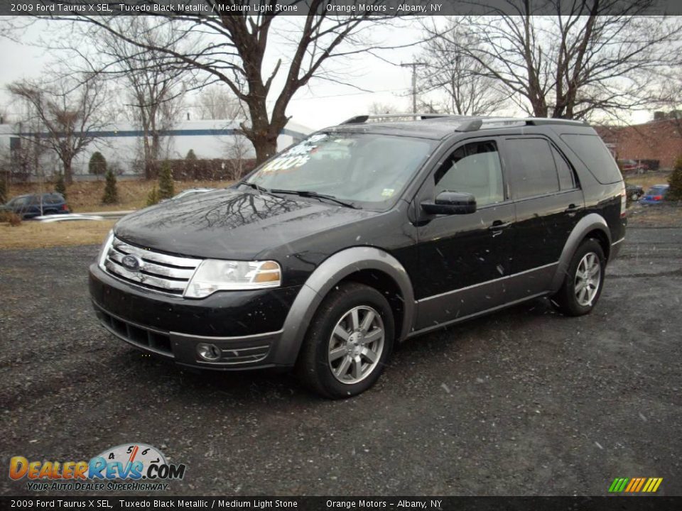 2009 Ford Taurus X SEL Tuxedo Black Metallic / Medium Light Stone Photo #1