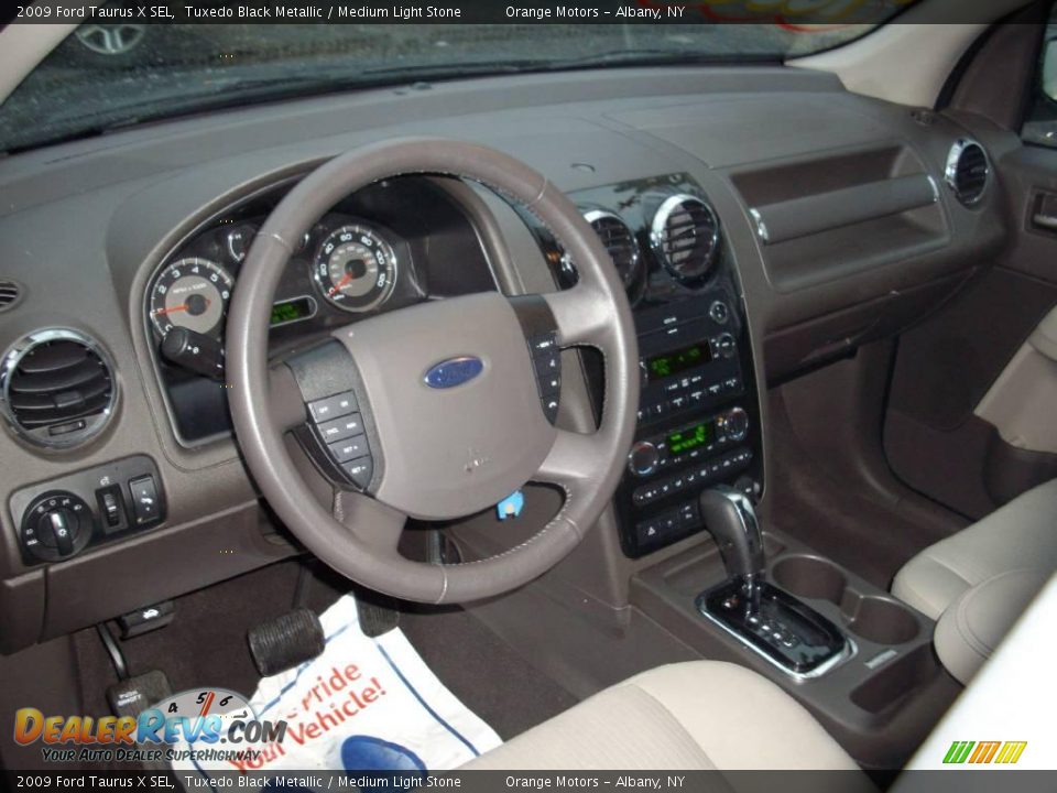 2009 Ford Taurus X SEL Tuxedo Black Metallic / Medium Light Stone Photo #13