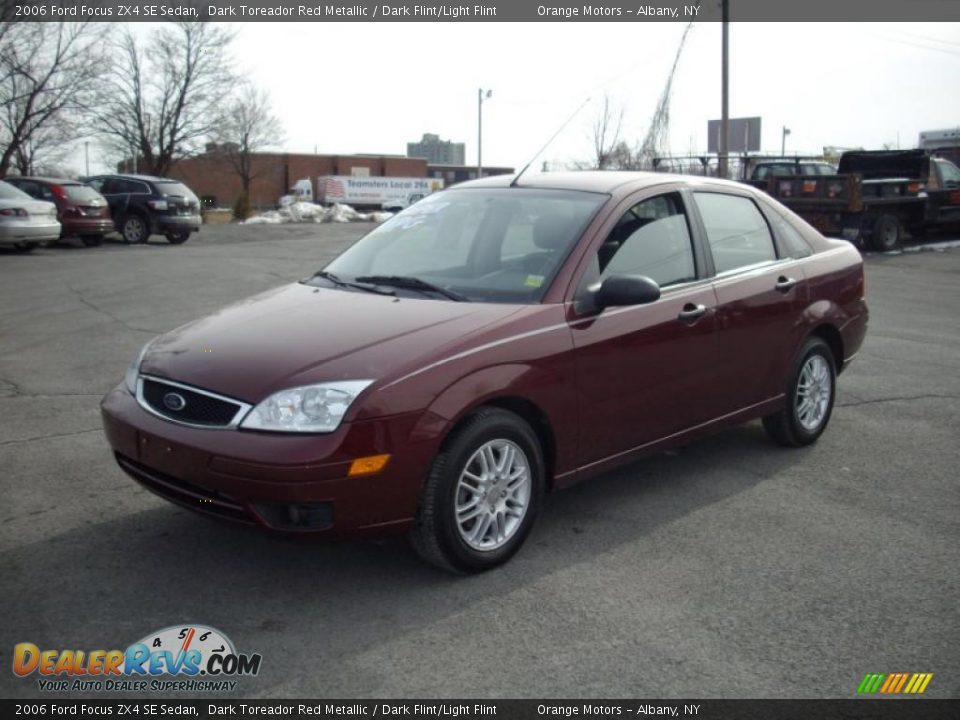 2006 Ford Focus ZX4 SE Sedan Dark Toreador Red Metallic / Dark Flint/Light Flint Photo #1