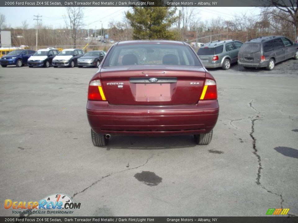 2006 Ford Focus ZX4 SE Sedan Dark Toreador Red Metallic / Dark Flint/Light Flint Photo #3