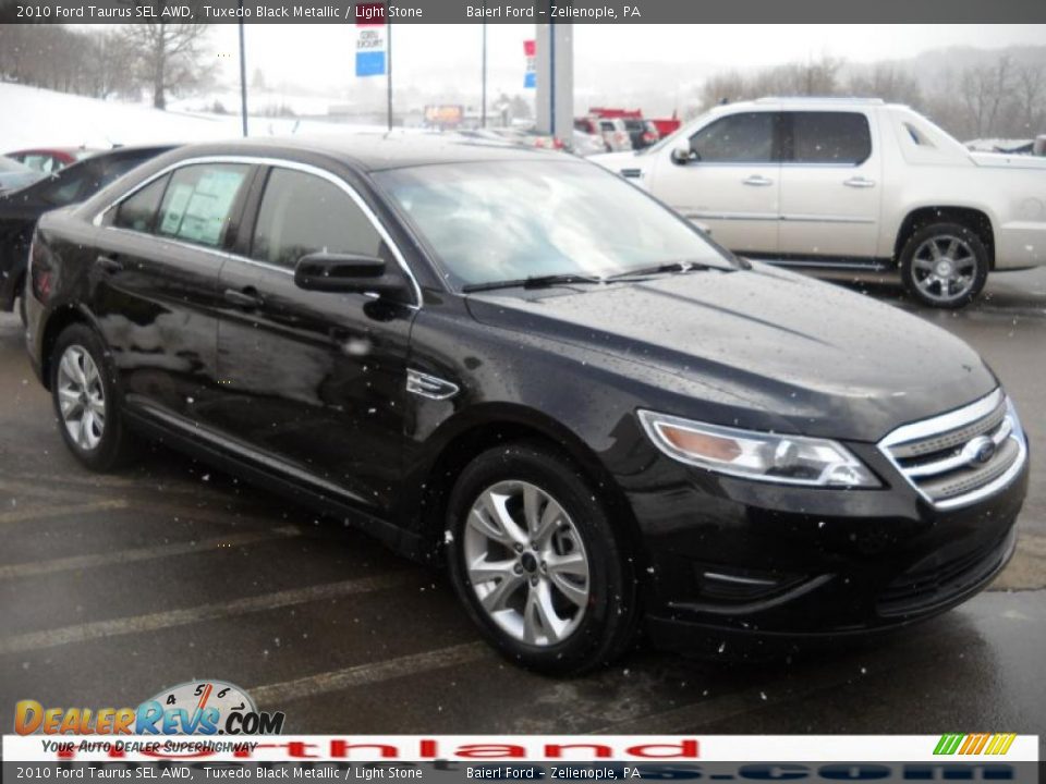 2010 Ford Taurus SEL AWD Tuxedo Black Metallic / Light Stone Photo #4