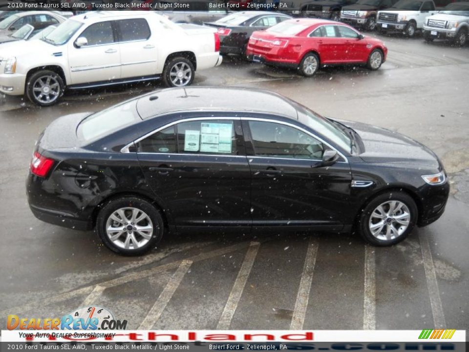 2010 Ford Taurus SEL AWD Tuxedo Black Metallic / Light Stone Photo #5