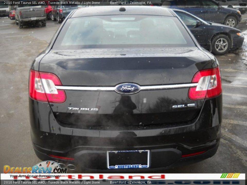 2010 Ford Taurus SEL AWD Tuxedo Black Metallic / Light Stone Photo #7