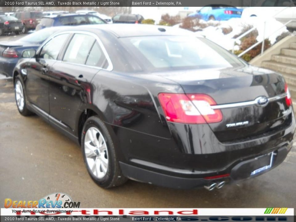 2010 Ford Taurus SEL AWD Tuxedo Black Metallic / Light Stone Photo #8