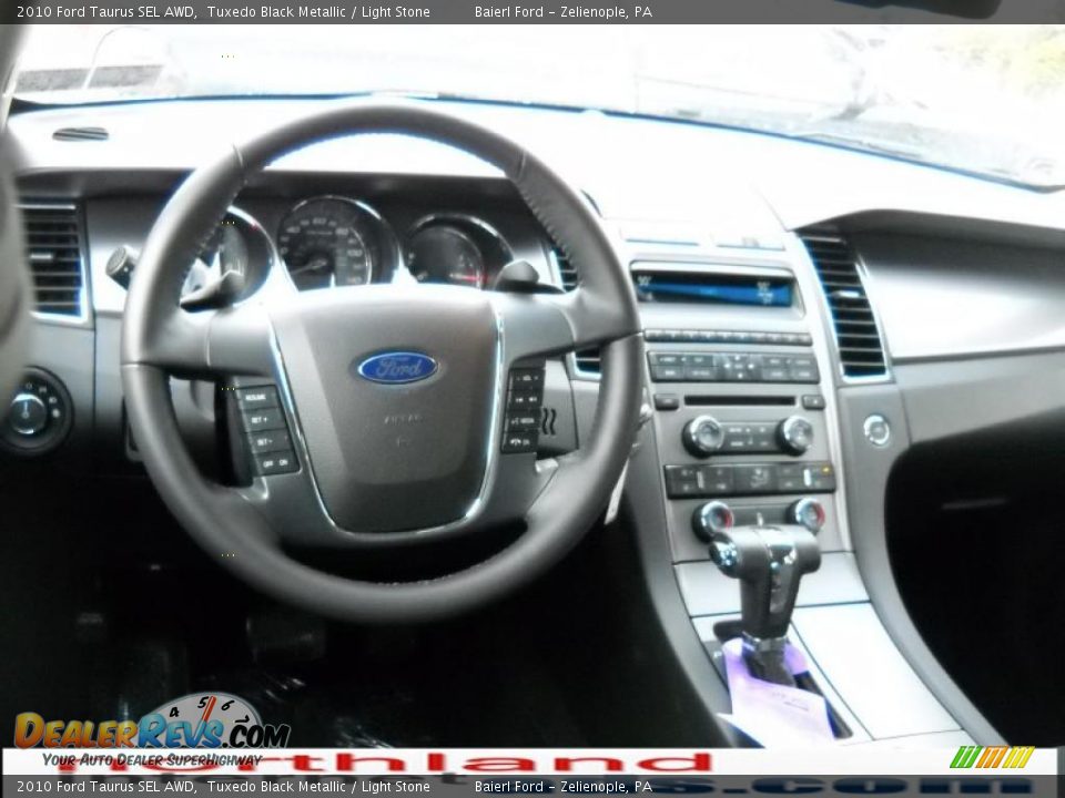 2010 Ford Taurus SEL AWD Tuxedo Black Metallic / Light Stone Photo #14