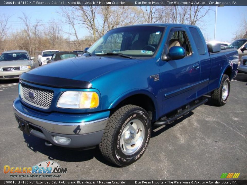 Front 3/4 View of 2000 Ford F150 XLT Extended Cab 4x4 Photo #2