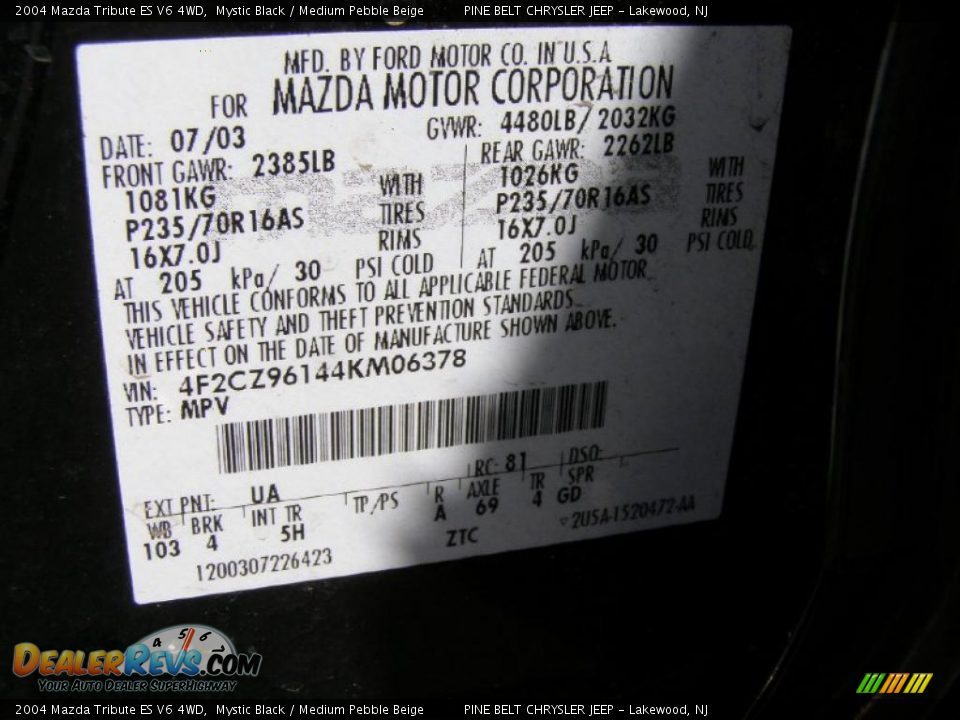 2004 Mazda Tribute ES V6 4WD Mystic Black / Medium Pebble Beige Photo #11