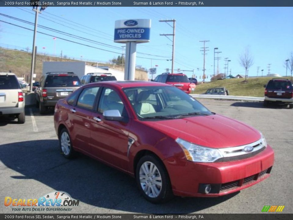 2009 Ford Focus SEL Sedan Sangria Red Metallic / Medium Stone Photo #1