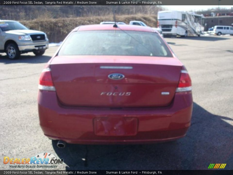 2009 Ford Focus SEL Sedan Sangria Red Metallic / Medium Stone Photo #4