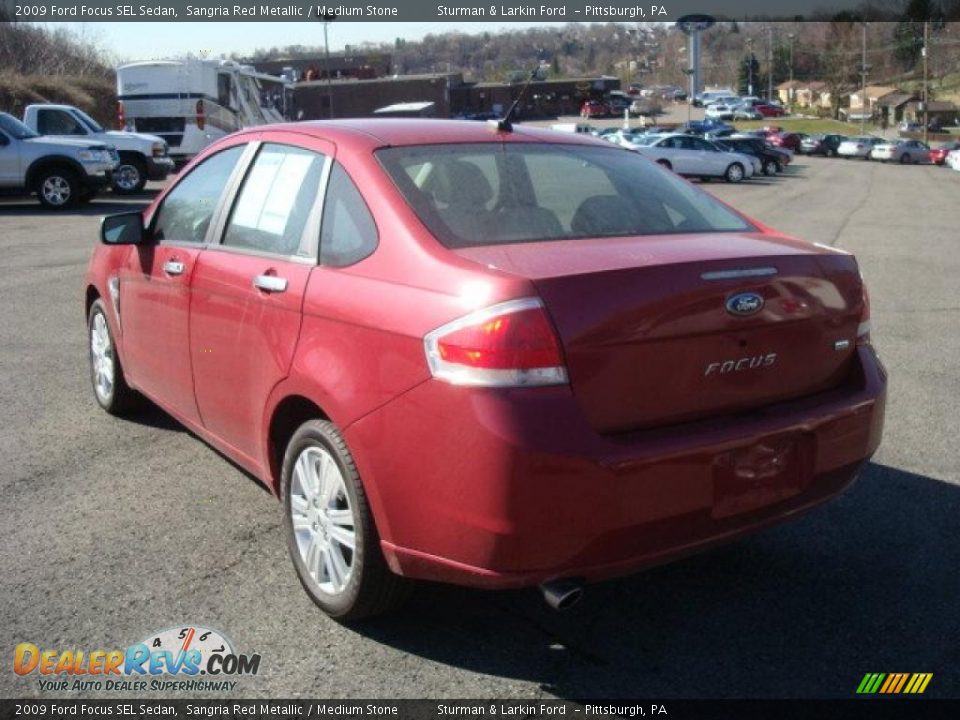 2009 Ford Focus SEL Sedan Sangria Red Metallic / Medium Stone Photo #5