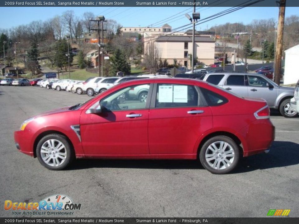 2009 Ford Focus SEL Sedan Sangria Red Metallic / Medium Stone Photo #6