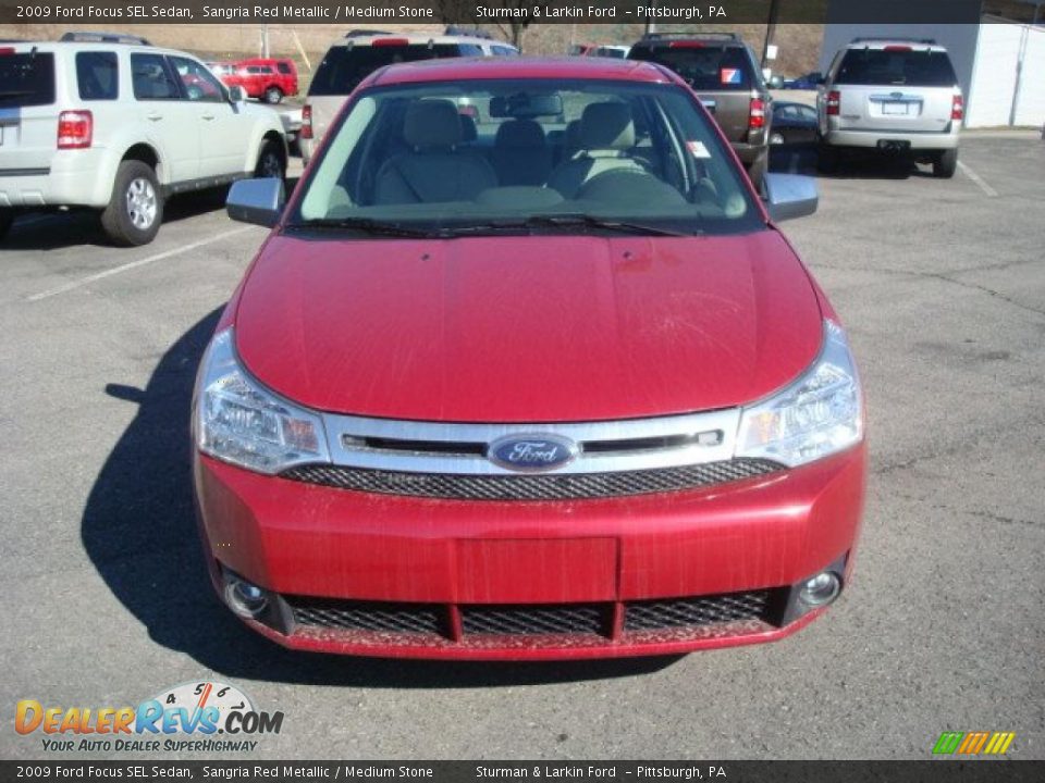 2009 Ford Focus SEL Sedan Sangria Red Metallic / Medium Stone Photo #11