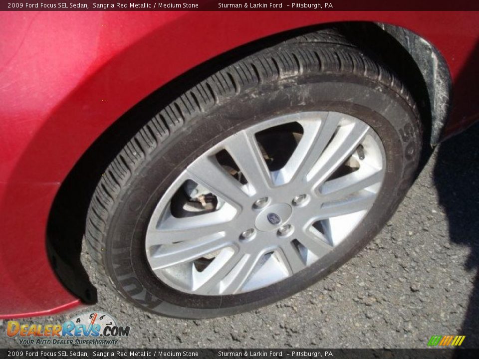 2009 Ford Focus SEL Sedan Sangria Red Metallic / Medium Stone Photo #12
