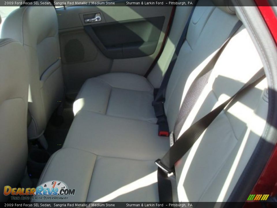 2009 Ford Focus SEL Sedan Sangria Red Metallic / Medium Stone Photo #13