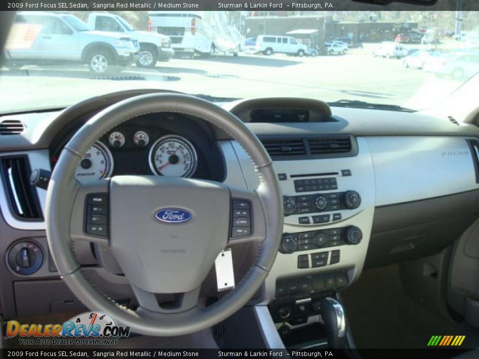 2009 Ford Focus SEL Sedan Sangria Red Metallic / Medium Stone Photo #14