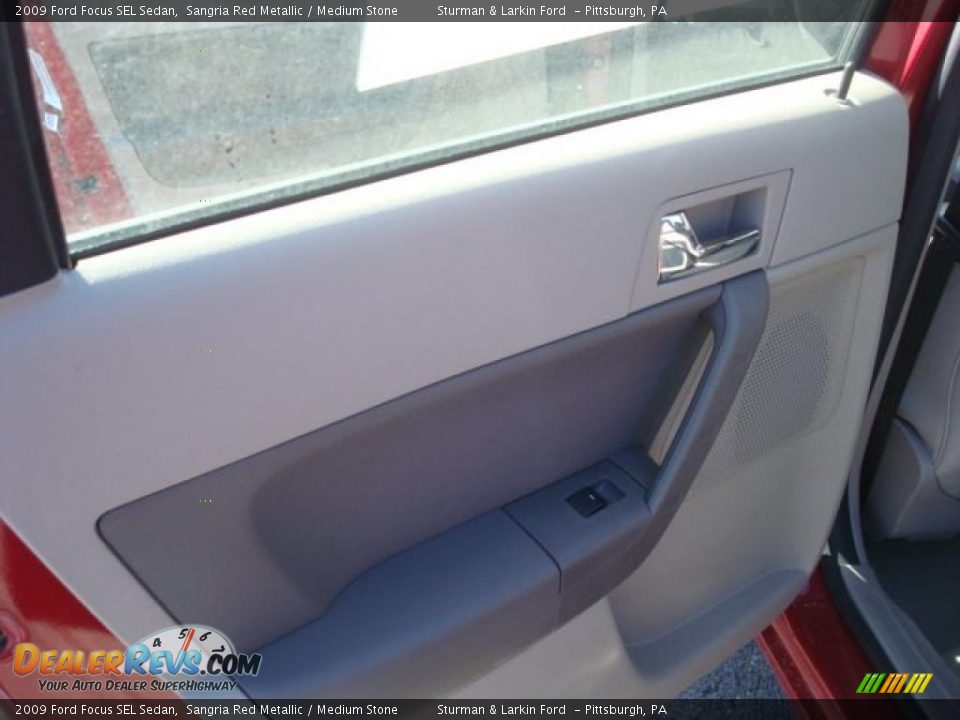 2009 Ford Focus SEL Sedan Sangria Red Metallic / Medium Stone Photo #15