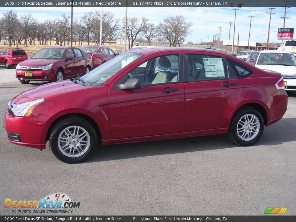 2009 Ford Focus SE Sedan Sangria Red Metallic / Medium Stone Photo #2