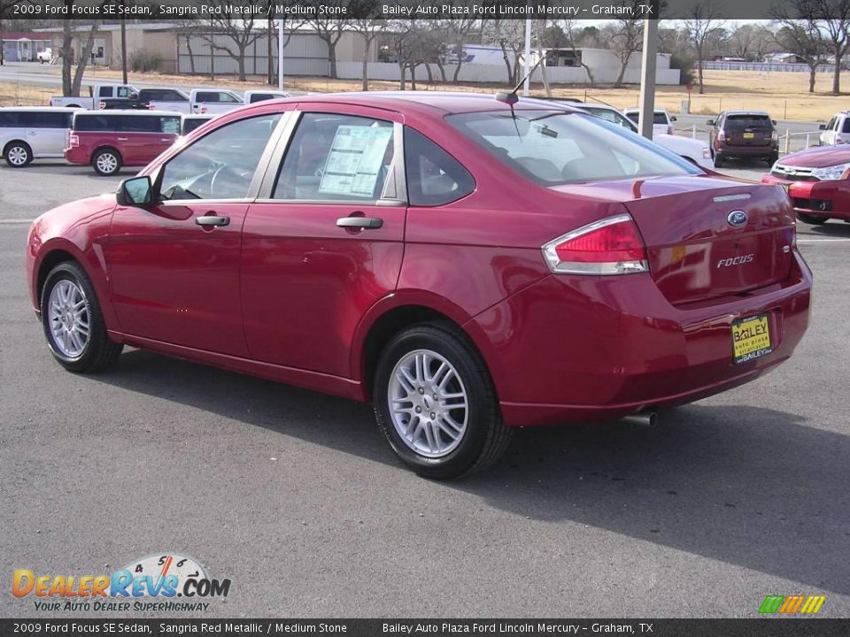 2009 Ford Focus SE Sedan Sangria Red Metallic / Medium Stone Photo #3