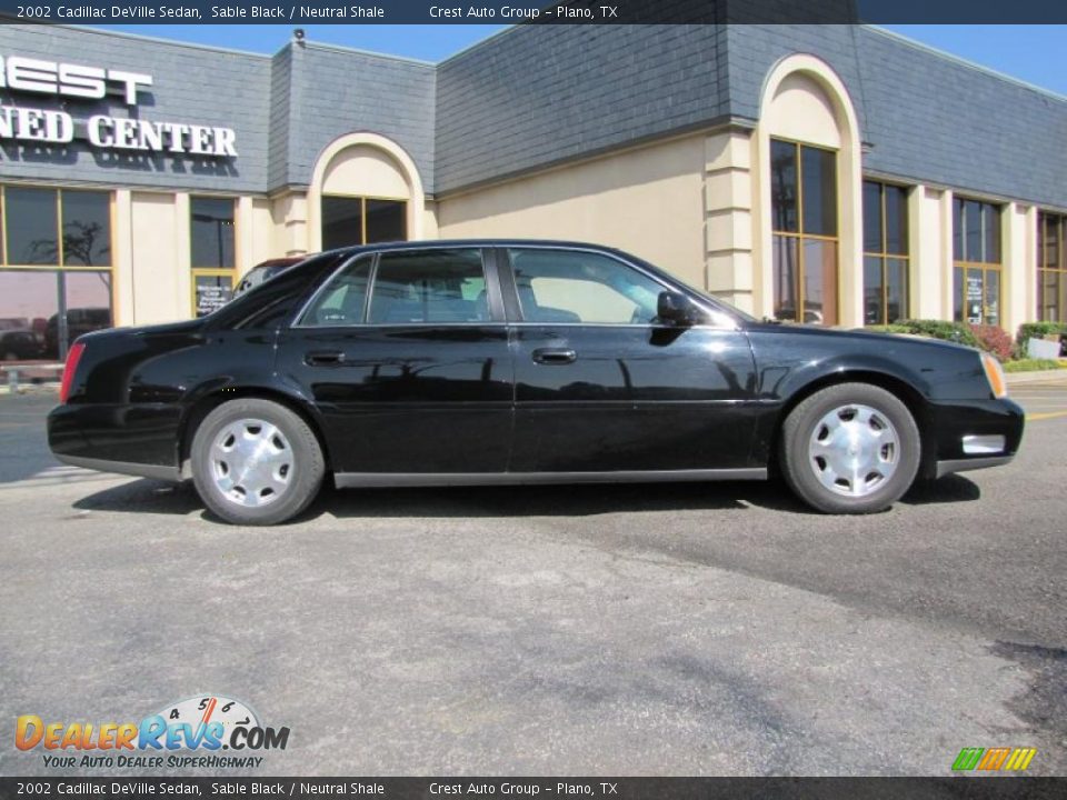2002 Cadillac DeVille Sedan Sable Black / Neutral Shale Photo #7