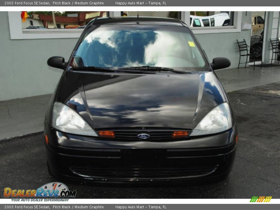 2003 Ford Focus SE Sedan Pitch Black / Medium Graphite Photo #3