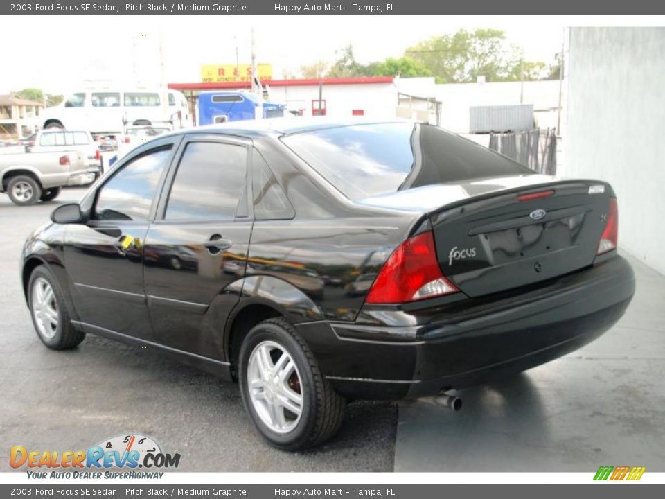 2003 Ford Focus SE Sedan Pitch Black / Medium Graphite Photo #4