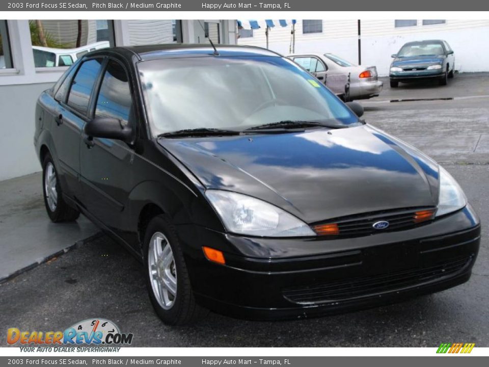 2003 Ford Focus SE Sedan Pitch Black / Medium Graphite Photo #5