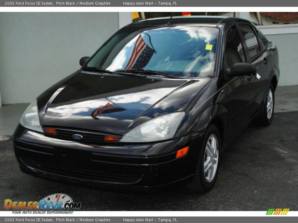 2003 Ford Focus SE Sedan Pitch Black / Medium Graphite Photo #6