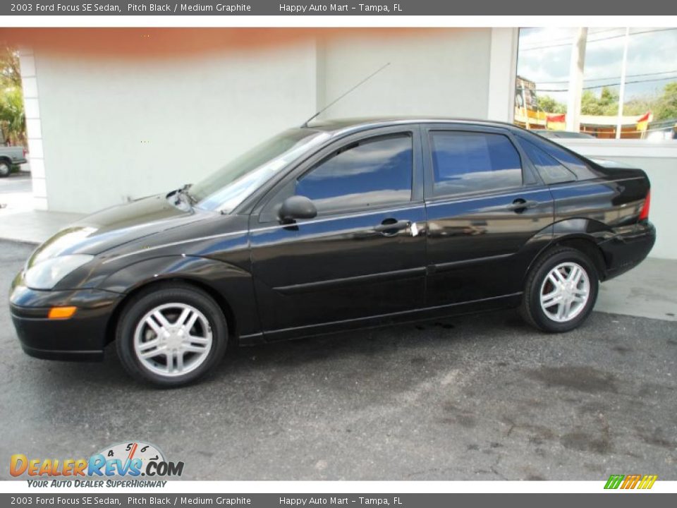 2003 Ford Focus SE Sedan Pitch Black / Medium Graphite Photo #8