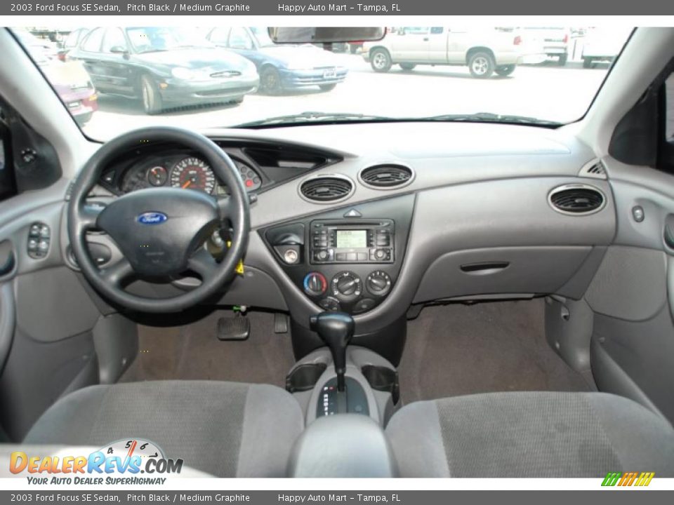 2003 Ford Focus SE Sedan Pitch Black / Medium Graphite Photo #25