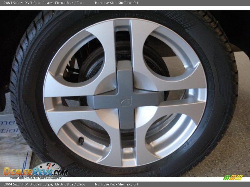 2004 Saturn ION 3 Quad Coupe Electric Blue / Black Photo #25
