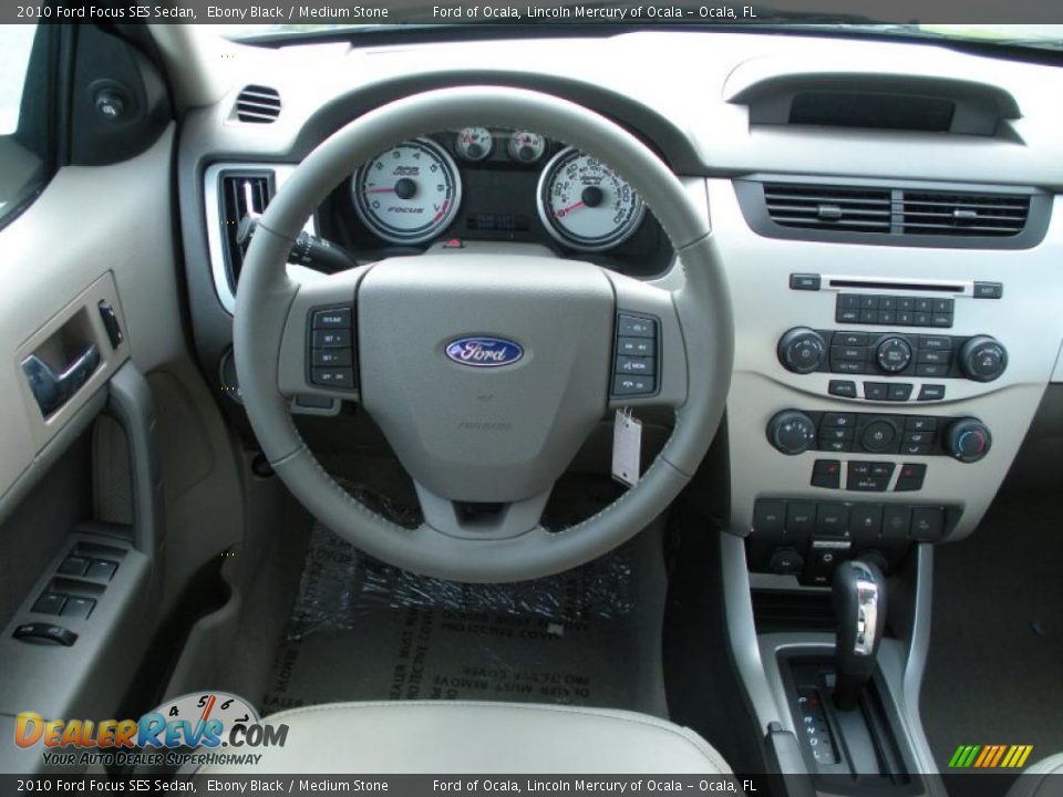 2010 Ford Focus SES Sedan Ebony Black / Medium Stone Photo #7