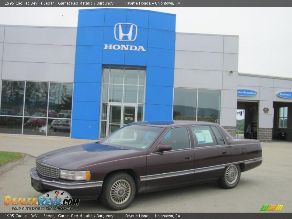 1995 Cadillac DeVille Sedan Garnet Red Metallic / Burgundy Photo #1