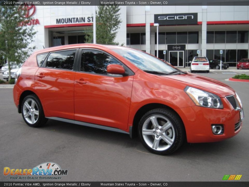 2010 Pontiac Vibe AWD Ignition Orange Metallic / Ebony Photo #1