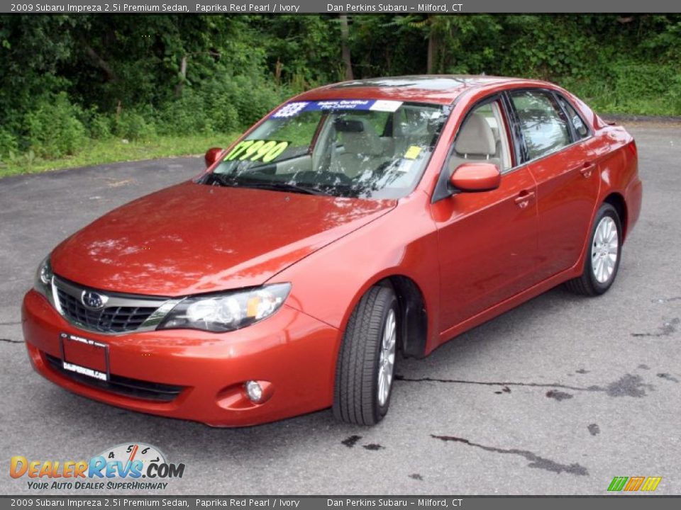 2009 Subaru Impreza 2.5i Premium Sedan Paprika Red Pearl / Ivory Photo