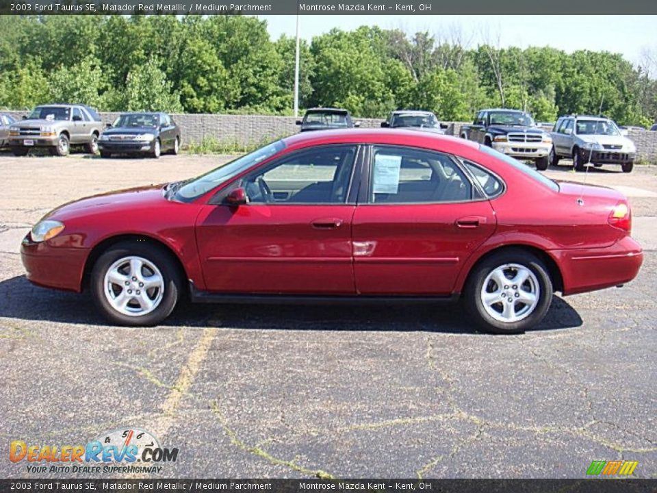 2003 Ford Taurus SE Matador Red Metallic / Medium Parchment Photo #1