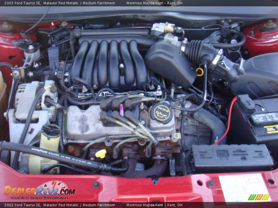 2003 Ford Taurus SE Matador Red Metallic / Medium Parchment Photo #20