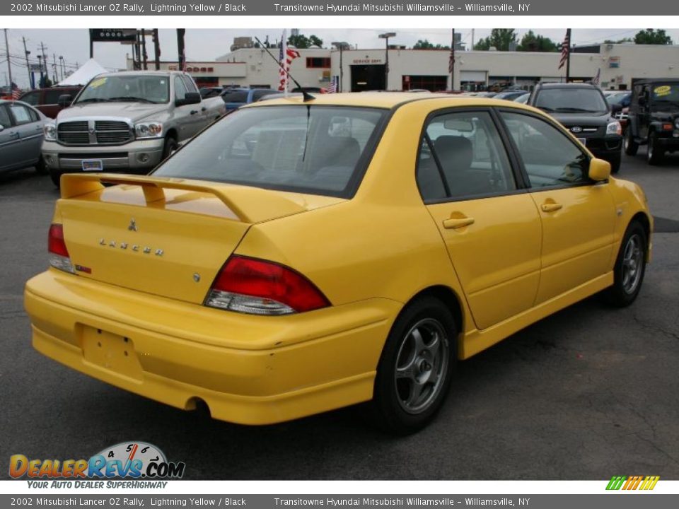 2002 Mitsubishi Lancer OZ Rally Lightning Yellow / Black Photo #12