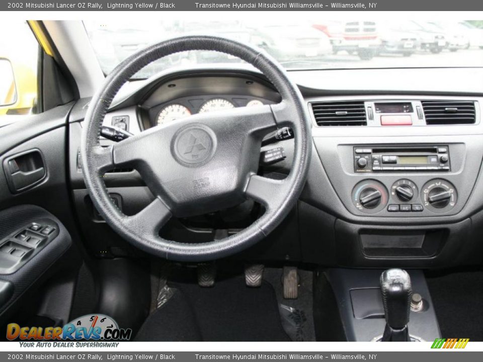 2002 Mitsubishi Lancer OZ Rally Lightning Yellow / Black Photo #20