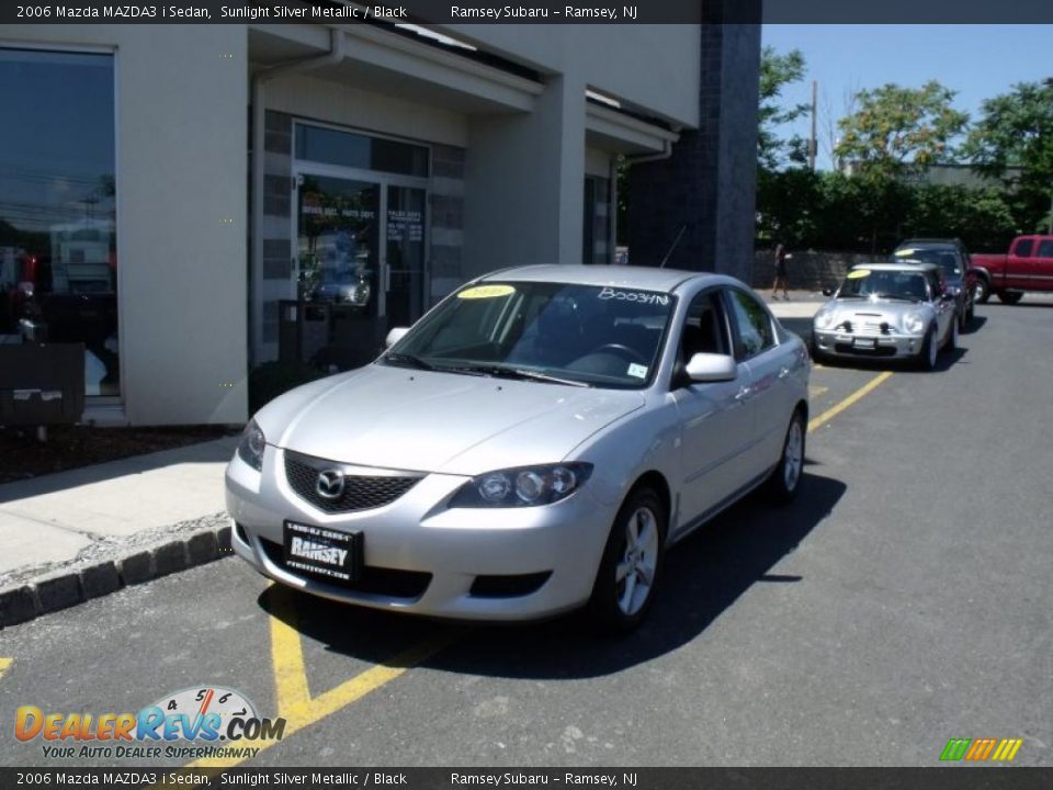 2006 Mazda MAZDA3 i Sedan Sunlight Silver Metallic / Black Photo #2