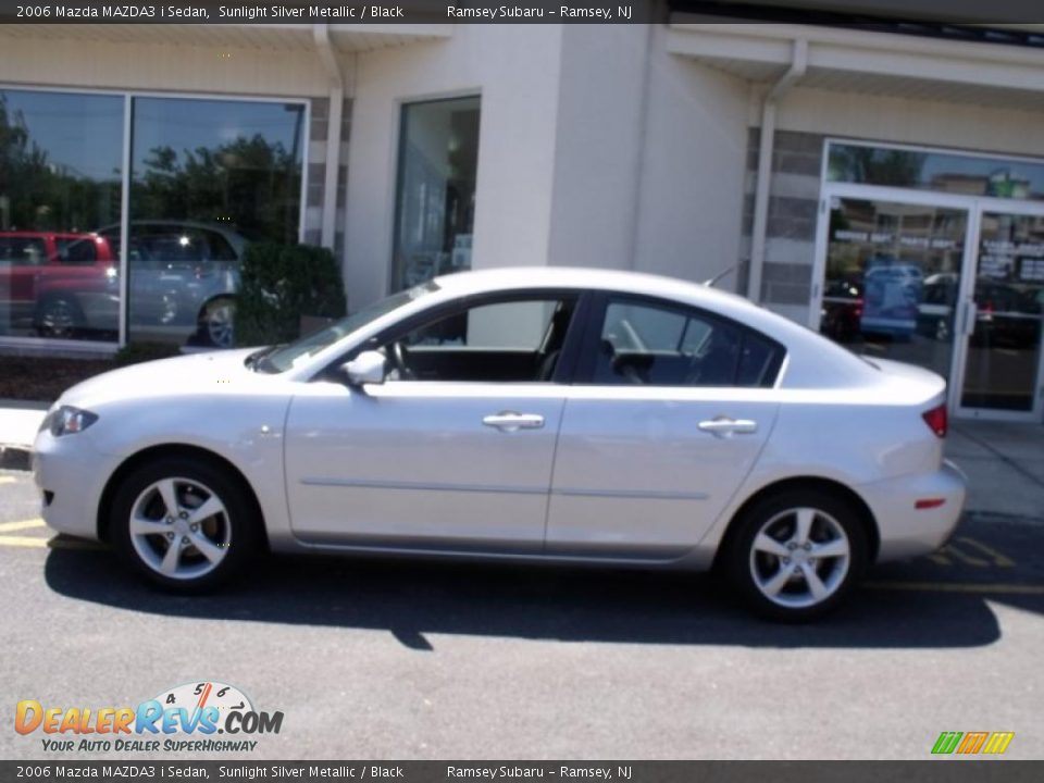 2006 Mazda MAZDA3 i Sedan Sunlight Silver Metallic / Black Photo #4