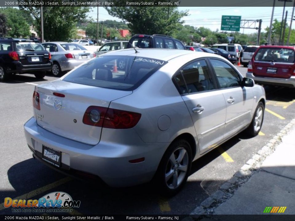 2006 Mazda MAZDA3 i Sedan Sunlight Silver Metallic / Black Photo #7